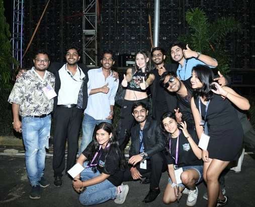 A group of students sharing a moment at the festival